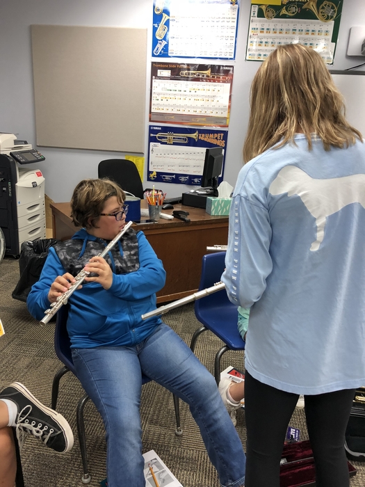 Carlie helping with flutes