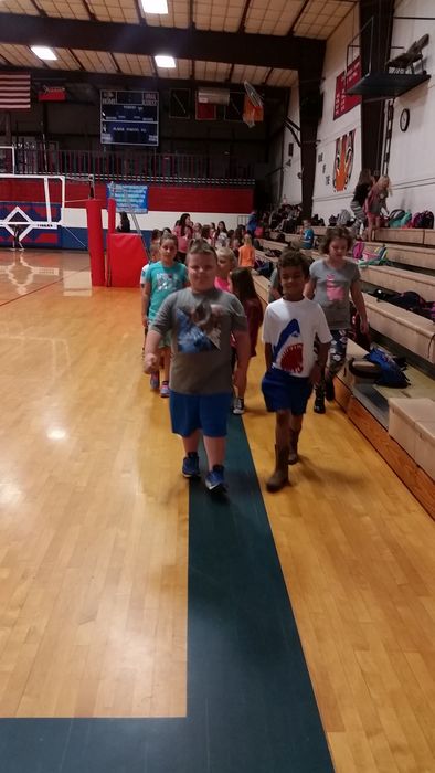 Students on their morning walk in the gym